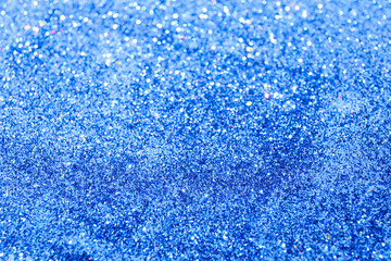 Closeup view of blue glitter as background