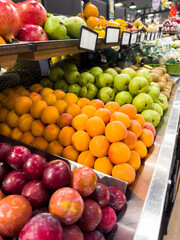 Apricot and fresh plum in the supermarket. Vegetables and fruits exposed for consumer choice. Brazilian hortifrutti