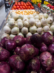 Fresh onions in the supermarket. Vegetables and fruits exposed for consumer choice. Brazilian hortifrutti