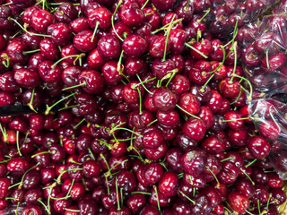Fresh cherry in the supermarket. Vegetables and fruits exposed for consumer choice. Brazilian hortifrutti