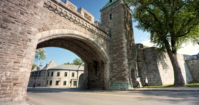 Car drives through the St. Louis Gate in Quebec City Canada