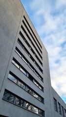 concrete apartment building against a blue sky in Tallinn, Estonia