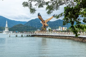 Deurstickers Langkawi, Malaysia - December 12, 2022: The Eagle of Langkawi. Landmark of the Malaysian Island. Huge statue of an eagle at the Eagle Square near the Kuah Jetty and the Langkawi global eco park. © Holger