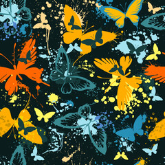 Seamless pattern of butterflies from watercolor blots. Bright watercolor butterflies on a black background. Abstract hand-drawn texture.
