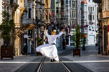 Sufi Whirling Dervish in the Istiklal Street Taksim, Beyoglu Istanbul, Turkey