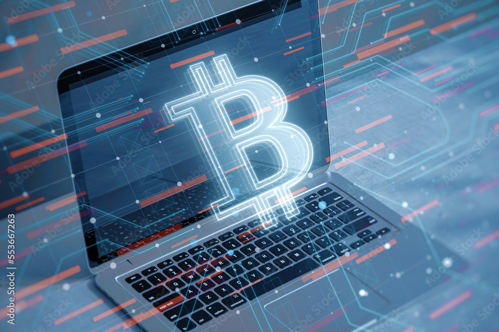Poster close up of laptop with glowing bitcoin hologram on blurry desktop background. cryptocurrency and fi