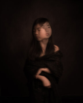 abstract double exposure portrait of asian girl in black in dark studio style
