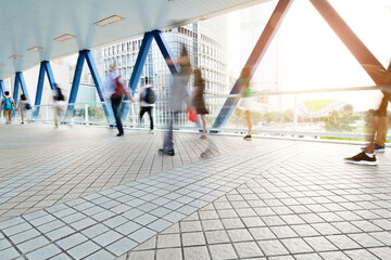 Blurred of people walking on the footbridge