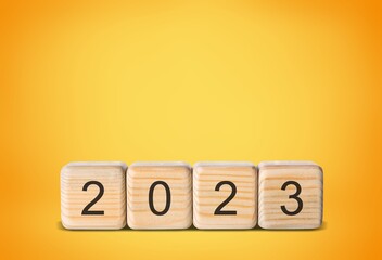 Wooden cube blocks set for 2023 new year concept