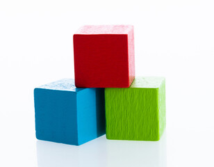 Three wooden blocks on white background