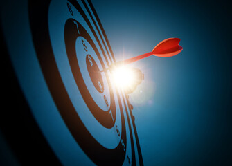 Close up of dart on target