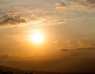 Fototapeta na wymiar Sunset sky with white clouds