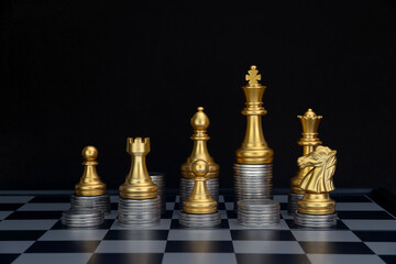Gold Chess with Coins. Chess with piles of coins on the board. Plan the use of money. Money game...