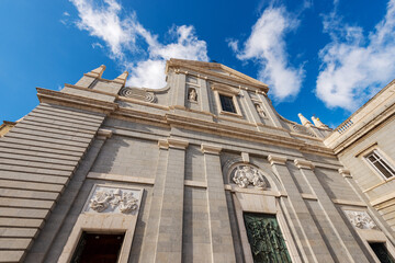 Facade of the Almudena Cathedral (Catedral de Santa Maria la Real de la Almudena) in Madrid downtown, Spain, southern Europe. Neo-Romanesque, neo-Gothic and neo-classical style, 1883-1993.