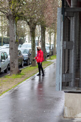person walking in the rain