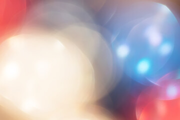 Abstract blurred background red with blue with highlights and bokeh.
