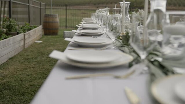 Wedding tableware set up at backyard wedding venue. Shot in 4K 60FPS for high quality slow motion. Purchase entire event raw at wholesale price email willneatheryyahoo.com.
