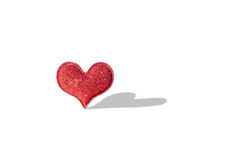 Red glitter heart shape with shadow on transparent background
