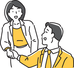 握手する男女社員