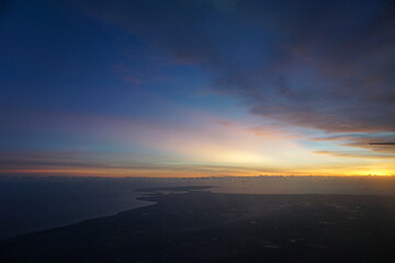 skyline view of a plane in the afternoon