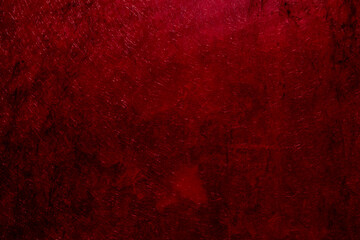 Crimson colored background with wavy textures of different shades of dark red