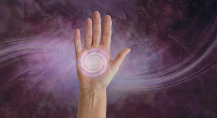 Diagram of palm chakra spinning energy vortex - open upright female hand with a pale pink spiral...