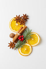 Christmas spices decoration with cinnamon, dried orange slices, star anise and  nutmeg.