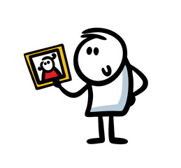 A satisfied man holds a portrait photo of his beloved girl in a beautiful frame.