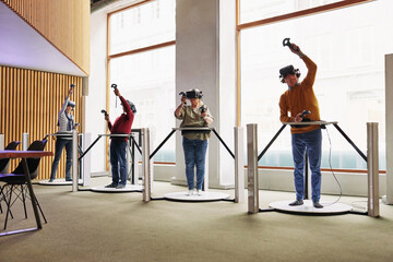 Seniors exploring a virtual world at a vr club