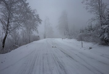 Snowy mountain road in winter
