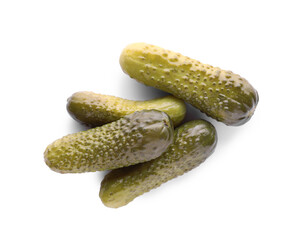 Pile of tasty pickled cucumbers on white background, top view