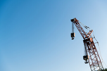 Fototapeta premium Looking crane working from below