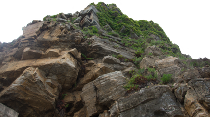 Isolated PNG cutout of a cliff on a transparent background, ideal for photobashing, matte-painting, concept art