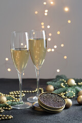 Black caviar on a christmas decorated black table