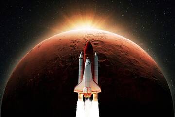 Space shuttle rocket with blast takes off to the red planet mars with dawn rays light. Successful...