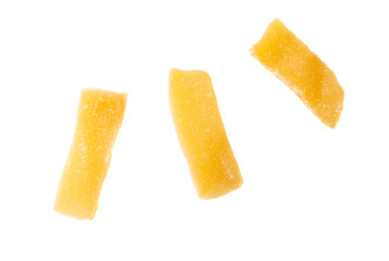 Dried pieces of Annona muricata pulp isolated on white