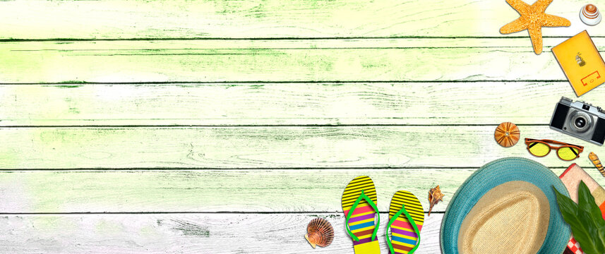 Topview Beach Accessories Background on Green Wood