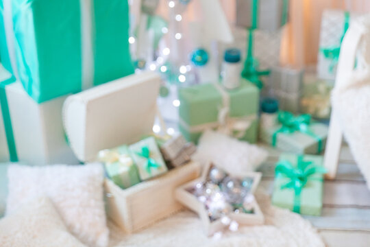Blur Christmas scene with stylish mint studio Christmas interior