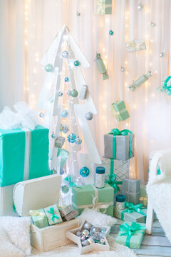 Stylish living room or studio Christmas interior in mint and tiffany colors