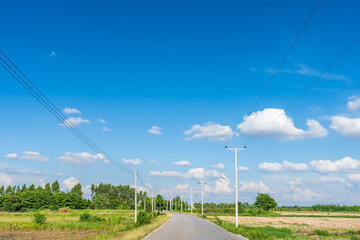 Fototapeta na wymiar view of asphalt roads countryside Beside with spring nature and tree green in fluffy clouds blue sky daylight background.