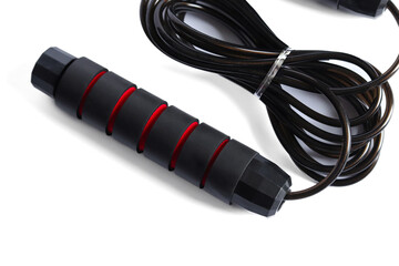 High performance black jump rope isolated on a white background. Sports, fitness, cardio, martial art and boxing accessories.
