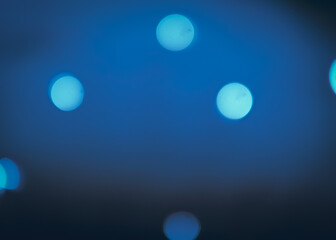 Dark blue round bokeh background copy space. High quality photo
