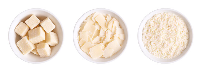 Grana Padano cheese, chunks, flakes and grated, in white bowls. Italian hard cheese, similar to Parmesan, with a savory flavor and a crumbly, slightly gritty texture, made from unpasteurized cow milk. - obrazy, fototapety, plakaty