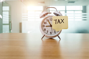 Alarm clock with word tax