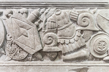 Roman military armor. Roman marble sarcophagus, Selcuk (Ancient Ephesus), Turkey (Turkiye). Art or military history concept. Retro background