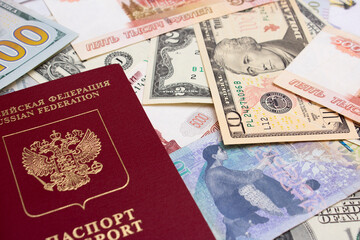 Russian biometric passport lies on background of cash banknotes of Russia, Georgia, USA. Currency exchange, travel, tourism, immigration concept. Money to buy tickets, rent an apartment. USD. Bill