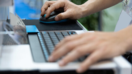 Man hand working on control panel