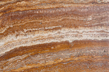 Textured brown and white natural marble veining detail. Stone background