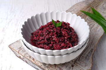 Tape Ketan Hitam. Fermented black glutinous rice, a typical accompaniment for Tape Uli.