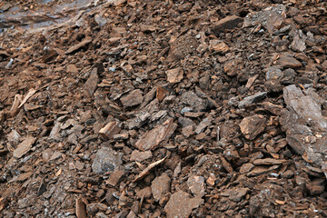 Interesting traces on coal made by the excavator during its operation. Visible result of excavator digging.	